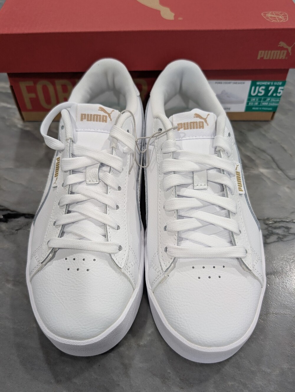 Puma White Leather Sneakers with Gold Branding